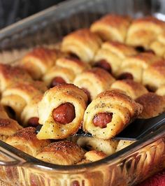 hotdogs wrapped in crescent rolls on a tray