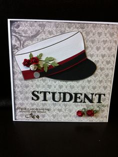 a card with an image of a hat and flowers on the front that says student