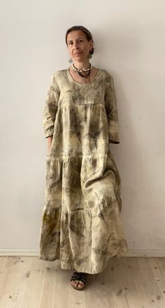 Wonderful one-piece linen dress with long sleeves and with side pockets. It is 100 % linen, eco printed with sumac leaves and dyed in walnuts leaves extract. The natural colors of green, khaki, navy and black blend perfectly with each other. I dye and sew all the items in my shop myself. Total length is 130 cm (51.18 in) . The dress can be made shorter. Flat measurements and size chart are listed on the photo. This dress will fit you perfectly if you wear a size M. You can wear it even if you are size S but like looser clothes. Measurements for size M: It is bust circumference up to 92 cm ( 36.22 in) Waist up to 74 cm (29.13 in) Hips up to 99 (38.98 in) The model for all my garments is me. Unfortunately, I am not tall, my height is 158 cm (62.2 in). I wear size S clothes. Thread count (met Eco Print Dress, Spring Bohemian Linen Dress With Pockets, Bohemian Linen Dress For Fall, Bohemian Beige Long Sleeve Linen Dress, Spring Linen Dress With Natural Dye, Ecoprint Dress, Lagenlook Dress, Eco Print, Eco Clothing