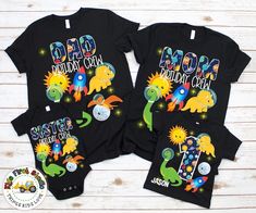 two black shirts with dinosaurs on them and the words happy birthday written in white letters