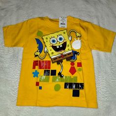 a yellow shirt with an image of spongebob on it