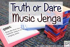 a stack of wooden blocks with the words truth or dare music lenga