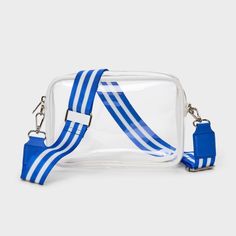 Gameday crossbody bag from Wild Fable™ with a transparent design. Lightweight vinyl construction with a zippered compartment. Light blue and white striped strap with a buckle for adjustability and side clips for attaching or detaching completes the design. If you're not satisfied with any Target Owned Brand item, return it within one year with a receipt for an exchange or a refund. Wild Fable™: A look for every story Transparent Design, Crossbody Messenger Bag, Mini Tote, Wild Fable, Handbag Accessories, Dark Red, Purses Crossbody, Apparel Accessories, Adjustable Straps