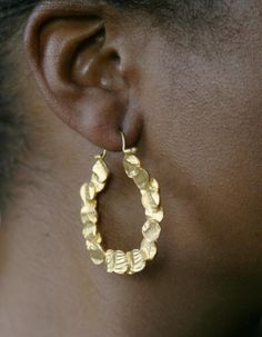 Delicately textured circles surround themselves into a lightweight gold hoop. Created by hand in brass, then cast. This earring is a true beauty. Measures approx. 50mm or 2" from top to bottom. Brass casting, 22kt gold plate Sterling earwire 100 Circles, Gold Mobile, Beautiful Textures, Gold Hoops, Gold Hoop, Art Market, True Beauty, Jewelry Stores, Perfect Pair