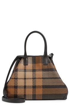 Woven plaid refreshes the look of this signature tote that quickly converts to offer a chic assortment of varying silhouettes. Carry as a classic shopper or cinch it using the inventive turnlock tabs to create a streamlined trapezoidal silhouette, a hallmark of the Akris fashion house. A long strap offers additional versatility, allowing you to seamlessly switch from handheld to crossbody styling. Open top Top carry handles; removable, adjustable crossbody strap Turn-in turnlock tabs Interior po Fall Brown Coated Canvas Shoulder Bag, Chic Coated Canvas Bags For Fall, Chic Fall Shoulder Bag In Coated Canvas, Chic Fall Coated Canvas Shoulder Bag, Woven Leather Tote, Top Top, Fashion House, Open Top, Braided Leather