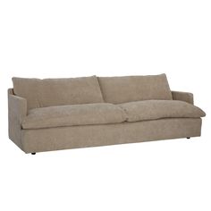 a beige couch sitting on top of a white floor