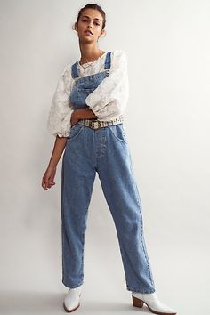 So essential and forever timeless, these special denim overalls from our We The Freecollection are featured in a relaxed, slouchy silhouette with tapered legs and exaggerated pocket detail for added dimension. **Note:** Size and placement of distressing may vary slightly. Free People Store, Empire Waistline, Denim Overalls, Boho Clothing, Powder Blue, Pocket Detail, Tapered Legs, American Style, Boho Outfits