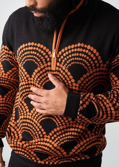 Style#: M7005 Cozy up this fall in the Kibo Men's African Print Quarter-Zip Sweater in Black Amber Dots. It's the perfect layering piece that spices up any outfit. Features: Gold metal zip Contrast rib knit with at-sleeve cuff and mock neck Contrast black knit sleeves shoulder and upper chest 45% Cotton/55% Acrylic Knit Designed in the USA, imported Care Instructions: Hand wash cold. Do not soak. Do not bleach. Lay flat to dry. Models: Size: M | Height 6’ | Chest 38.5” | Waist 33” Size: L | Heig Quarter Zip Sweater, Knit Sleeve, Sleeve Cuff, Mens Fall, Workout Accessories, Printed Bags, Zip Sweater, Sweater Black, Swimwear Accessories