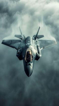 a fighter jet flying through the cloudy sky