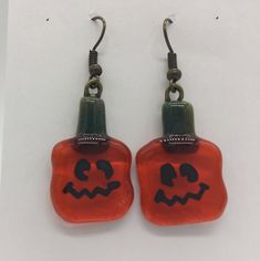 These fused glass earrings celebrate Halloween and the Fall season.  I have used a variety of accent colors and design elements to design them including a variety glass materials.  These are all one-of-a-kind so I hope you find a pair that you like. These are perfect for Fall or as a gift or as stocking stuffers for someone special.  The earrings are about an inch long and with the wire hook are about 1 1/2 inches in length. Thanks for looking. Fun Halloween Earrings For Gifts, Fun Halloween Earrings Gift, Fun Halloween Gift Earrings, Fun Red Halloween Jewelry, Red Fun Halloween Jewelry, Fun Red Jewelry For Halloween, Fused Glass Earrings, Fused Glass Jewelry, Valentines Gifts For Him