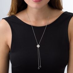 Complement your attire with this dazzling diamond lariat bolo necklace. Crafted in sterling silver, this adjustable style features a quartet of shimmering diamonds - each artfully set to enhance size and sparkle - wrapped in a polished ribbon and another frame of diamonds. Vary the look by re-centring the bolo design along the lariat chain. Radiant with 1/10 ct. t.w. of diamonds and a brilliant buffed luster, this wheat chain necklace adjusts up to 26.0 inches in length and is finished with open tilted cushion-shaped drops. Adjustable Diamond Necklace With Diamond Accents, White Gold Lariat Jewelry With Diamond Cut, White Gold Diamond Cut Lariat Jewelry, Adjustable Sterling Silver Necklace With Diamond Accents, Luxury Sterling Silver Lariat Necklace, White Gold Lariat Diamond Necklace, White Gold Lariat Necklace With Diamond Cut, White Gold Diamond Cut Lariat Necklace, White Gold Diamond Lariat Necklace With Accents