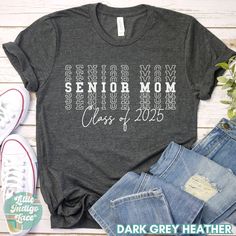 This will be the cutest way to celebrate your graduate for 2025. Show them how proud you are & represent your 2025 senior graduate in this senior mom t-shirt. It will be a great gift idea for any mom with a graduating son or daughter. -100% Airlume combed and ringspun cotton - Runs true to UNISEX size ♡ DISCLAIMERS: - Colors may vary depending on the device you are viewing them on This item is made especially for you as soon as you place an order so it can take a little longer to deliver it to you.  Please be sure to check our shipping & policies page for more information on production, shipping times, & cancellation policy. We don't accept returns because our items are made to order. Please contact us if you need any assistance. Senior Mom Shirts, Senior Tshirts, Graduate Ideas, Class Shirts, Senior Stuff, 2024 Ideas, Graduation Picture Poses