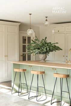 If redecorating your kitchen is at the top of your to-do list for 2024, green continues to lead the way in inspiring the heart of the home. A natural colour to complement kitchens, this palette draws on the understated hues of fresh herbs and produce like sage and olive - and for those dreaming of a more statement shade, decadent emerald and deep forest greens are in demand. No matter your desired aesthetic, look no further as we explore the most inspiring green kitchen ideas for 2024. Sage Green Kitchen Chairs, Sage Green Kitchen Table, Sage Green And Beige Kitchen, Sage Green Island Kitchen, Sage Kitchen Island, Light Green Kitchen Ideas, Green And Beige Kitchen, Cream And Green Kitchen, Sage Green Kitchen Colour Scheme