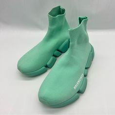 Balenciaga's Iconic Sock-Style Sneakers Set Atop A Chunky Sole Exude Athleisure Minimalism. Polyamide/Elastane Upper Almond Toe Pull-On Style Rubber Sole,Color Is Mint,Come With Dust Bag/Box. Made In Italy Green High-top Sneakers For Sports In Spring, Green Ankle-high Sneakers For Sports, Sporty Green Ankle-high Sneakers, Green Slip-on High-top Sneakers For Sports, Balenciaga Sock Sneakers, Balenciaga Green Sneakers, Yellow Balenciaga Shoes, Iconic Socks, Balenciaga 3xl Sneaker