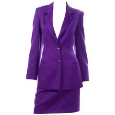 This is a fabulous Claude Montana vintage 1990's purple wool skirt suit with silver hardware & leather back belt attached to the jacket. You can wear this outfit as a suit or break up the set for 2 great separates! This incredible suit has a longline silhouette blazer with a pencil skirt. The blazer has Montana's familiar metal snap buttons down the front and on the cuffs of the sleeves. The shoulders are structured with shoulder pads and there are faux slit pockets on the sides of the blazer. T Superman Legacy, Suits Outfits, Retro Suits, Claude Montana, Versace Pink, Bustle Skirt, Wool Knitted Dress, Unique Jackets, Lois Lane