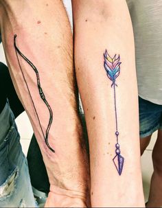 two people with matching tattoos on their arms, one has an arrow and the other has a bow