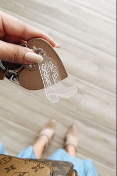 + D E S C R I P T I O N: Our frosted cowboy / cowgirl boots keychain is the perfect southern addition to your keys or bags.If you are planning or attending a Last Rodeo Bachelorette party these are the perfect neutral favors that will match ANY decor. The cowgirl / cowboy boots are the perfect favor to get any party started. The acrylic itself is ENGRAVED and NOT filled with paint. This gives it a neutral finish of clear and off white colors + S T Y L E: Choose Between Silver or Gold Keyrings + Cowboy Keychains, Rodeo Party Favors, Last Rodeo Party, Cowgirl Keychain, Cowboy Boot Keychain, Keychains Aesthetic, Western Keychain, Last Rodeo Bachelorette Party, Boot Keychain