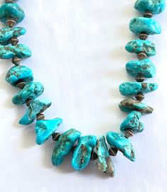 Navajo Sterling and Turquoise Nugget Necklace, Natural Sleeping Beauty Turquoise, Native American Jewelry, 22 Inch,  Boho Gift for Her Beautiful chunky Navajo natural Sleeping Beauty turquoise and sterling silver spacer bench beads necklace.  Hook eye clasp.  The necklace is 22"  The turquoise nuggets  have a lovely pyrite matrix.  Not signed but test sterling silver. Wonderful vintage condition. More Native American https://www.etsy.com/shop/VintageVogueTreasure?ref=hdr&search_query=native+american More Gemstones https://www.etsy.com/shop/VintageVogueTreasure?ref=hdr&search_query=gemstone Antique Napkin Rings, Nugget Necklace, Vintage Belt Buckles, Natural Sleep, Sleeping Beauty Turquoise, Disney Jewelry, Boho Gifts, Dangle Charms, American Jewelry