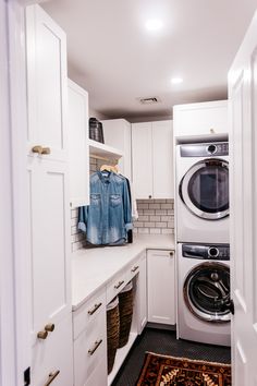 a washer and dryer in a small room