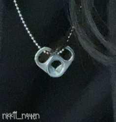 a silver necklace with a lock on it