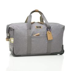 a grey duffel bag sitting on top of a white floor