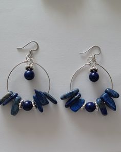 Handmade dangle hoop earrings FOLLOW US Instagram: https://www.instagram.com/rlewiscreations Twitter: https://twitter.com/rlewiscreations Facebook: https://www.facebook.com/rlewiscreations Handmade Blue Dangle Hoop Earrings, Blue Hoop Earrings With Ear Wire, Blue Dangle Hoop Earrings, Blue Hoop Earrings With Dangling Beads Gift, Adjustable Blue Teardrop Hoop Earrings, Blue Small Hoop Earrings Wire Wrapped, Blue Small Hoop Earrings With Wire Wrapping, Blue Dangle Hoop Earrings Hypoallergenic, Blue Wire Wrapped Hoop Beaded Earrings