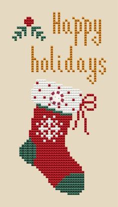 a cross stitch christmas stocking with the words happy holidays