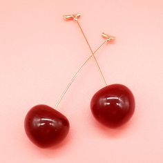 Handcrafted to display cherries dangling from a gold stem, these earrings will compliment all your basics. Go ahead, embrace your stylish side with these Retro Cherry Dangles. 
 Product ID: JW5463 
 Material: 14K Plated gold, resin 
 Size Info: 2.8X0.8 inch 
 A unique gift for any season 
 Sold in pairs www.ccovv.com Crazy Earrings, Retro Cherry, Earrings Bold, Fruit Jewelry, Retro Accessories, Apollo Box, Garden Wall Decor, Journal Stationery, Stationery Pens