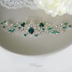 This is an elegant and romantic ''Sigrid''  green crystal hair comb from our wedding accessories collection. The silver hair comb is made with emerald and clear rhinestones. An emerald hair comb will be a perfect addition to many festive hairstyles for the green wedding. Each branch is flexible and can be moved to your liking. This green hair jewelry is the perfect accessory for brides, bridesmaids, Proms, and any special occasion.  Available in silver and gold, measures approx. 7,6" wide by 1,3 Emerald Green Hair, Champagne Hair, Emerald Hair, Festive Hair, Blue Wedding Hair, Crystal Hair Vine, Rhinestone Hair Comb, Royal Blue Wedding, Floral Hair Combs