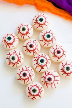 there are many fake eyeballs on the table