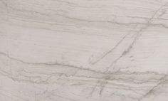 a white marble textured surface with black and grey lines on the top right side