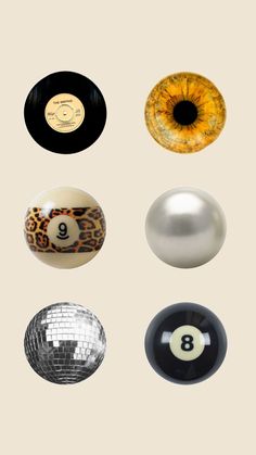 an assortment of pool balls with different shapes and sizes, including the number eight ball