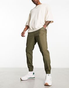 Pants & Chinos by Jack & Jones Talk about a wardrobe staple Regular rise Elasticated drawstring waist Side pockets Regular, tapered fit Olive Green Cargo Outfit Men, Olive Green Men Outfit, Olive Trousers Outfit Men, Olive Pants Outfit Men, Green Chino Outfit Men, Men’s Kakis Outfits, Men’s Green Chino Outfit, Chino Pants Men Outfits, Green Pants Outfit Men