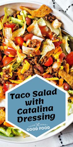 taco salad with cauliflower dressing in a white bowl on a black and white towel