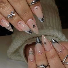 Silver Chrome Acrylic Nails, Metallic Silver Almond Nails, Almond Chrome Star Nails, Futuristic Almond Nails, Silver Chrome Nails With Stars, Silver Chrome French Tip Nails With Charms, Chrome Acrylic Nails, Maximalist Nails, Oval Nails Designs