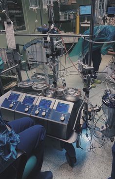 an operating room with multiple machines in it