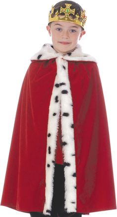 a young boy wearing a red cape with white fur and black spots on the chest