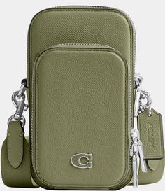 From COACH&#x2C; the Silver Hardware Phone Crossbody Bag features: Cross grain leather and signature coated canvasOne credit card slotZip closureFabric liningOutside zip pocketDetachable strap with approx. 25" drop for shoulder or crossbody wearApprox.: 4" L x 7" H x 2.5" WImported. Coach Store, Leather Clothing, Polished Pebble, Coach Men, Coach Crossbody, Signature Hardware, Clothes Closet, Coach Crossbody Bag, Coach Bag