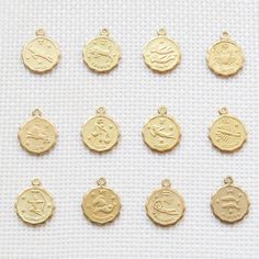 Our dainty zodiac coin necklace features a round scalloped pendant with a zodiac sign on it. …………………………………. Details: Pendant is Gold or Silver Plated over Brass measuring 12mm Chain is 14k Gold/Silver Plated, Gold Filled or Sterling Silver Average necklace length is 18" About Your Jewelry If you are not wearing your jewelry it is best to store it in a cool, dry place such as your gift box that is included in your ord Libra And Sagittarius, Sagittarius Scorpio, Holiday Hours, Home Candles, Coin Necklace, Paper Goods, Zodiac Sign, Zodiac Signs, Final Sale