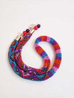 The seed bead crochet necklace is unique handmade work in boho style. The knotted necklace made of Czech beads,jeans tread, glass beads. Closure of the necklace is lobster claw🦞 🎀The size of the necklace: *20-21 inches with extension, *Diameter -0.39 inches ###SHIPPING### *North America-15-25 days, *Europe-10-20 days Beads Jeans, Seed Bead Rope, Beaded Crochet Necklace, Bead Rope, Modern Rainbow, Knotted Necklace, Beadwork Necklace, Beaded Crochet, Beautiful Beadwork