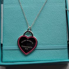 Tiffany & Co Return To Tiffany Pink Outline Medium Heart 16" Necklace Both Necklace And Pendant Charm Are Authentic Tiffany. Brand New, Never Worn. Some Faint Hairline Scratches From Handling For Pictures Will Come With Authentic Tiffany Box, Bow And Pouch All My Items Are 100% Authentic. 3rd Party Authentication & Certificate Available For An Additional $15 Heart Charm Necklaces For Valentine's Day Formal, Formal Heart Charm Necklaces For Valentine's Day, Tiffany's Heart Necklace, Pink Heart Pendant Necklace For Formal Occasions, Personalized Heart-shaped Necklace For Formal Events, Tiffany Pink Heart Necklace, Tiffany And Co Blue Heart Necklace, Tiffany Blue Heart Necklace, Tiffany And Co Heart Tag Necklace