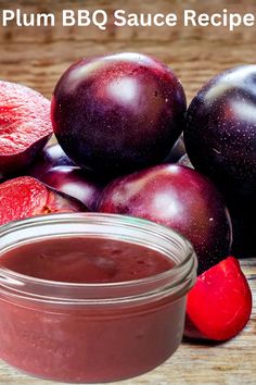 plum bbq sauce recipe in a glass jar next to sliced plums on a wooden table