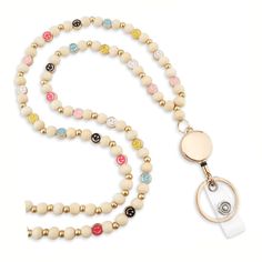 PRICES MAY VARY. 🥰 Bright & Cheerful Design: Features vibrant, handcrafted wooden beads with soft high-quality metal smiley faces, turning everyday wear into a fun and happy statement. 🥰 Lightweight & Practical: Crafted for comfort and convenience, this lanyard is ideal for securely holding badges, keys, and other essentials, making it both a functional and fashionable accessory. 🥰 Ideal Gift: Elegantly packaged, MyFavoriteK Lanyards are thoughtful presents suitable for everyone. - be it a wife, partner, mother, sister, friend, teacher, or nurse. A charming and practical choice for Birthdays, Anniversaries, Valentine's Day, or Christmas. Perfect for teachers, nurses, teaching assistants, daycare workers, office staff. 🥰 Quality: Our eco-friendly lanyards, made from pure wood and high-g Cheap White Lanyards For Crafting, Beaded Lanyards Boojee Beads, Cheap Keychain Lanyards For Teacher Appreciation, Cheap Multicolor Beaded Lanyards, Gudetama Lanyard, Beads Lanyard, Or Nurse, Teacher Lanyard, Office Staff