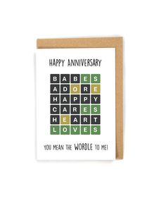 a card with the words happy anniversary written in black and green on it, which reads you mean the world to me