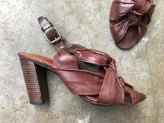 "Dries Van Noten. Size 37. Insole heel to toe: 9 5/8\" (24.5cm) heel: 3 5/8\" (9.2cm) ball width: 3.25\" (8.2cm)" Brown Slingback Pumps With Wrapped Heel For Spring, Brown Open Toe Slingback Pumps With Wrapped Heel, Brown Slingback Heels With Wrapped Heel, Brown Slingback Mules For Spring, Spring Brown Slingback Mules, Brown Slingback Sandals With 4-inch Heel For Spring, Vintage Open Toe Slingback Pumps For Summer, Vintage Open Toe Slingback Pumps For Spring, Slingback Sandals