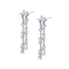 The Montage Baguette Chandelier Pave Earrings create an elegant modern style with sophisticated movement. These chandelier earrings feature angled baguette stud earrings with two pave drops, adorned with alternating baguette and round prong-set diamonds, separated by delicate pave bars. SKU #ER609 1.85ctw Gold Hex, Baguette Studs, Chandelier Chain, Pave Earrings, Womens Wedding Bands, Three Stone Rings, Cuff Earrings, High Jewelry, Mens Wedding Bands