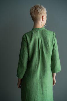 Linen shirt tunic with pockets The tunic is made of soft linen in green We sew it in sizes S, M, L Amelia is 176 cm tall and is wearing a size S Dimensions of the tunic measured flat: bust circumference S/100 cm M/104 cm L/108 cm hips S/110 cm M/114 cm L/118 cm tunic length 104 cm sleeve length 49 cm Material: 100% linen Green Linen Dress With Pockets, Green Linen Dress With Pockets For Spring, Spring Green Linen Dress With Pockets, Green Relaxed Fit Linen Dress With Pockets, Green Linen Casual Dress With Buttons, Green Linen Tops With Placket, Casual Green Linen Dress With Buttons, Green Tunic For Spring Daywear, Green Relaxed Fit Blouse With Pockets