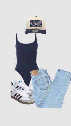 a hat, jeans and sneakers are on display