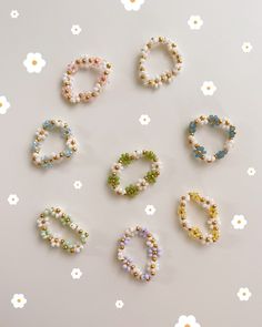 Whimsical White Jewelry With Pearl Charm, Whimsical White Round Jewelry, Cute Beaded Rings For Gifts, Cute White Jewelry With Colorful Beads, Cute Pearl Jewelry With Colorful Beads, Cute Handmade White Flower Ring, White Pearl Jewelry For Birthday, White Beaded Pearl Ring, Multicolor Beaded Flower Ring As Gift