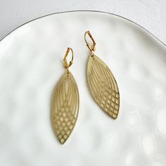 Add a modern touch to your style with this pair. Featuring patterned marquise shaped pendants, these earrings are chic and versatile. · Signature brushed gold plating on brass · Leverback clasp · 2.15" drop Gold Statement Jewelry, Simple Gold Earrings, Long Statement Earrings, Geometric Statement Earrings, Gold Geometric, Gems Jewelry, Modern Earrings, Geometric Earrings, Simple Jewelry